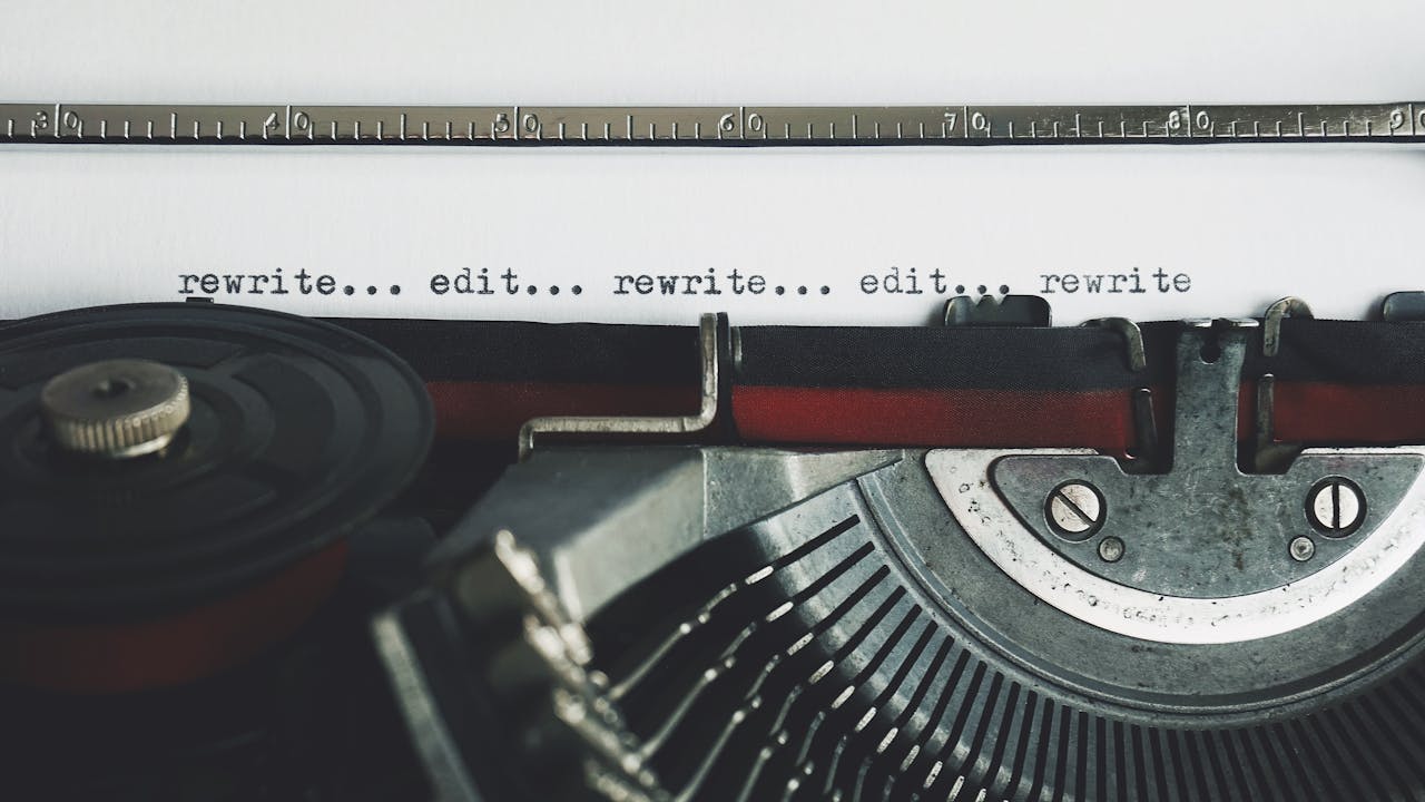 Classic typewriter with text rewrite... edit... on paper.